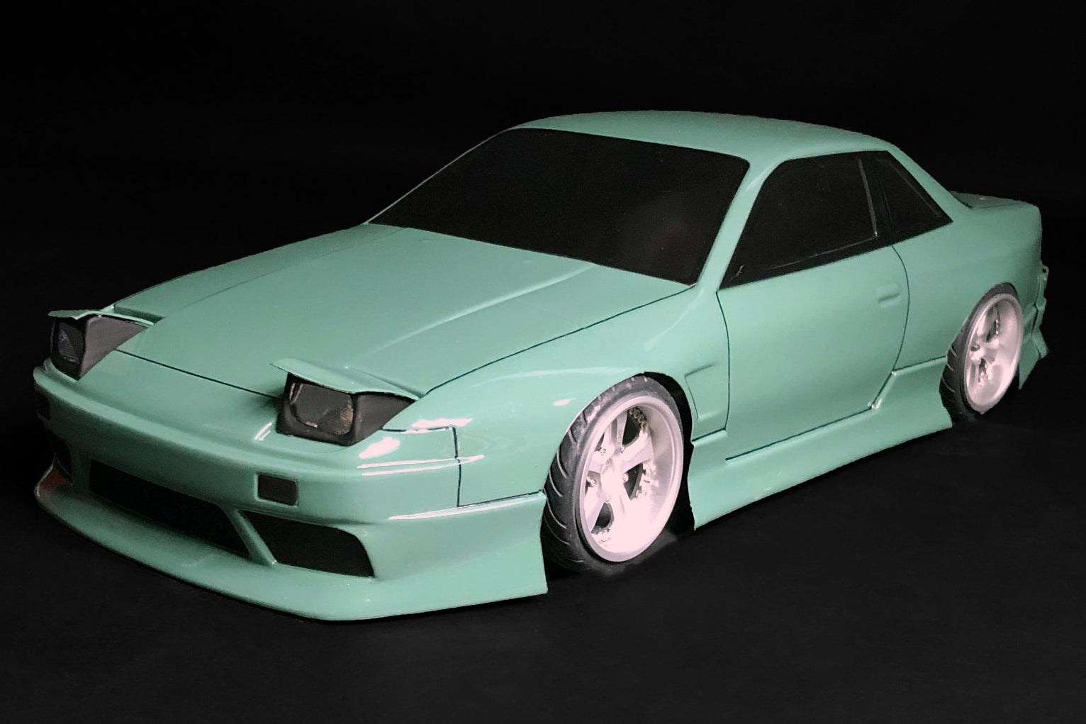 Nissan S13 Onevia RC body shell front three-quarter view with legendary 180SX front conversion styling