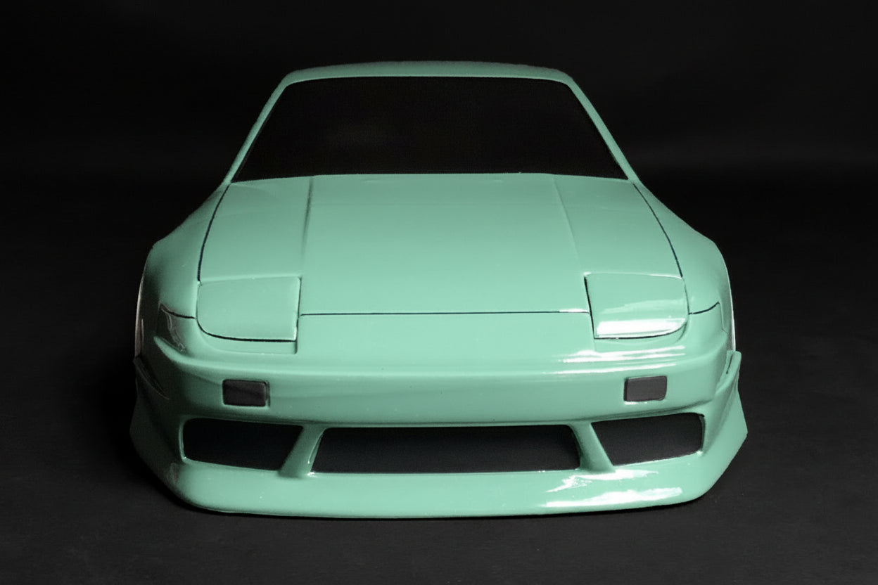 Nissan S13 Onevia 1/10 RC body shell front view featuring the iconic 180SX front end for 255–260mm wheelbase drift chassis