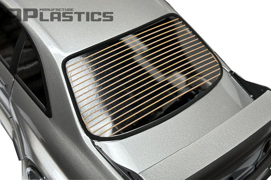 APlastics rear window defroster grid decal applied to a clear Lexan RC body shell showing the realistic heating line effect