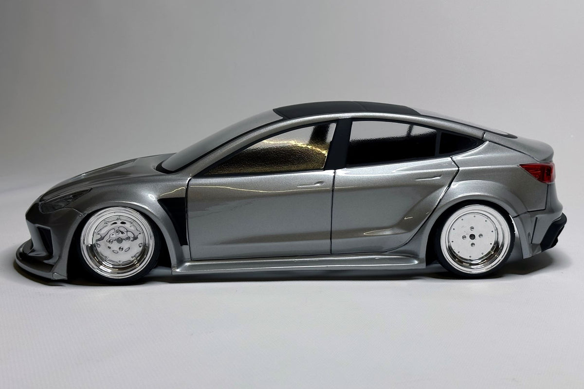 Tesla Model 3 Lexan RC body shell side profile showing contemporary performance sedan proportions